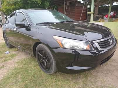 A picture of Honda Accord 2009 Model. 4 plugs