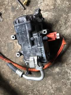 A picture of Toyota and Honda hybrid compressor available at affordable prices cheapandaffordable