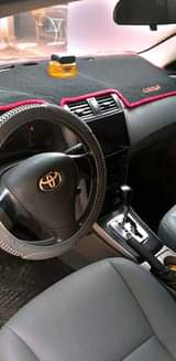 A picture of Pure Belgium grade American Spec 2010 Toyota Corolla in good