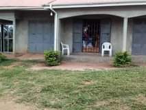 A picture of House with shops on quick sale