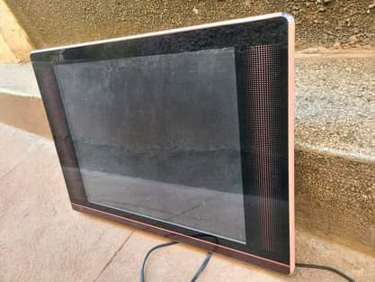 A picture of 14inch TV plus a star times decorder