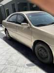 A picture of Toyota camry 2004 first body pan Untampered engine and gear