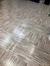 A picture of PVC plastic tile carpets