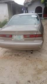 A picture of Sharp Camry Tiny Light Engine Gear AC needs attention Partly