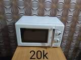 A picture of Tokunbo Microwaves going for 20k each