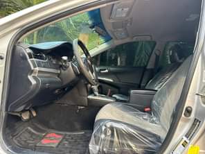 A picture of Mint 2014 Camry sport with untampered engine and follow come