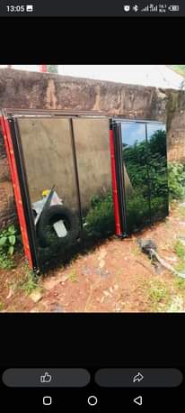 A picture of Casement windows frameless windows with protector and e