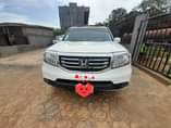 A picture of 2009 Honda pilot upgraded to 2013 10 months use u