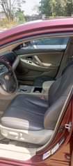 A picture of Toyota Camry 2010 model with chilling AC everything working Uyo