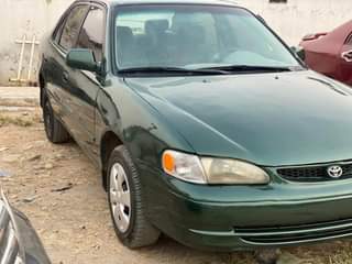 A picture of Extremely clean Toyota Corolla small but mighty With Sound Engine