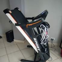 A picture of Gym equipments and dumbbells