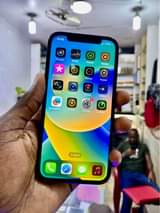 A picture of iPhone 12 64gb 1 45M Faceid working DM WhatsApp or