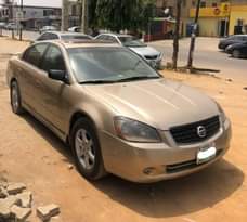 A picture of STILL AVAILABLE Clean Nigerian Used Gold Nissan Altima 2004 Baked