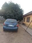 A picture of Kia Rio 1 4 2007 blue