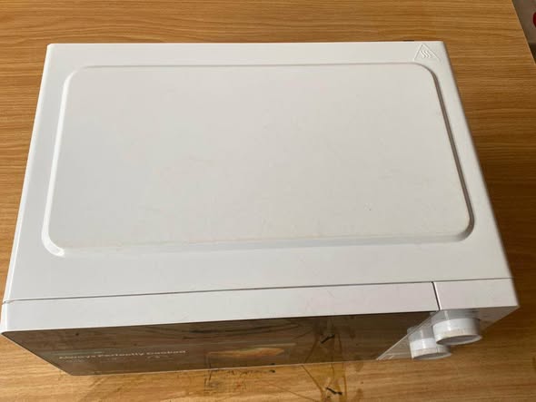 A picture of Hisense microwave for sale 2month used
