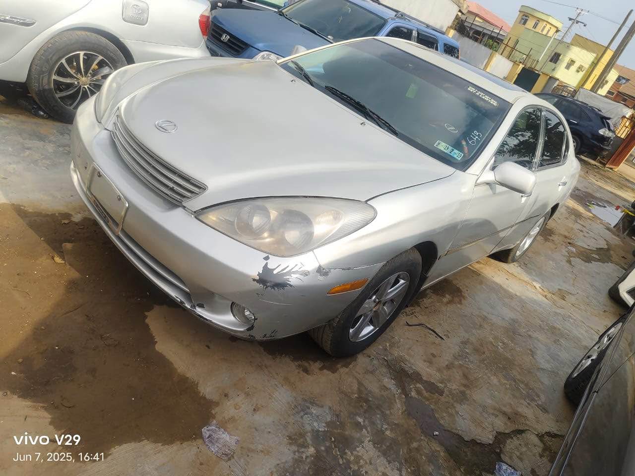 A picture of Lexus ES 300 2004 model engine gear ac android screen