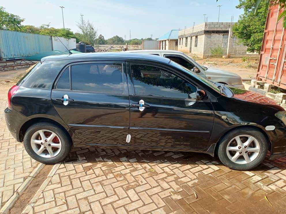 A picture of Distress 2004 manual drive Corolla with android screen buy nd