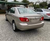 A picture of TOYOTA COROLLA 09035015509 COLOUR Gold PRICE 1 2m naira Hidden