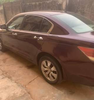 A picture of Clean Nigerian Used Wine Honda Accord 2010 Repainted Leather interior