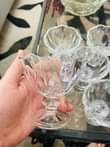 A picture of Glass vessels chairs and pasi table