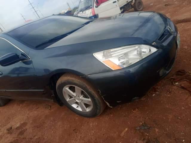 A picture of super clean 2004 model neatly painted Honda Accord with unterpered