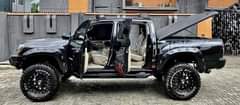 A picture of irect okumbo Toyota Tacoma TRD Pimped Ruggedly ustom uty ntact
