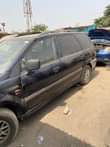 A picture of Mitsubishi space wagon.Engine smoking gear perfect. Location Agege Lagos call