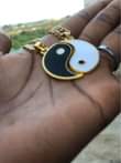 A picture of Yin yang necklaces