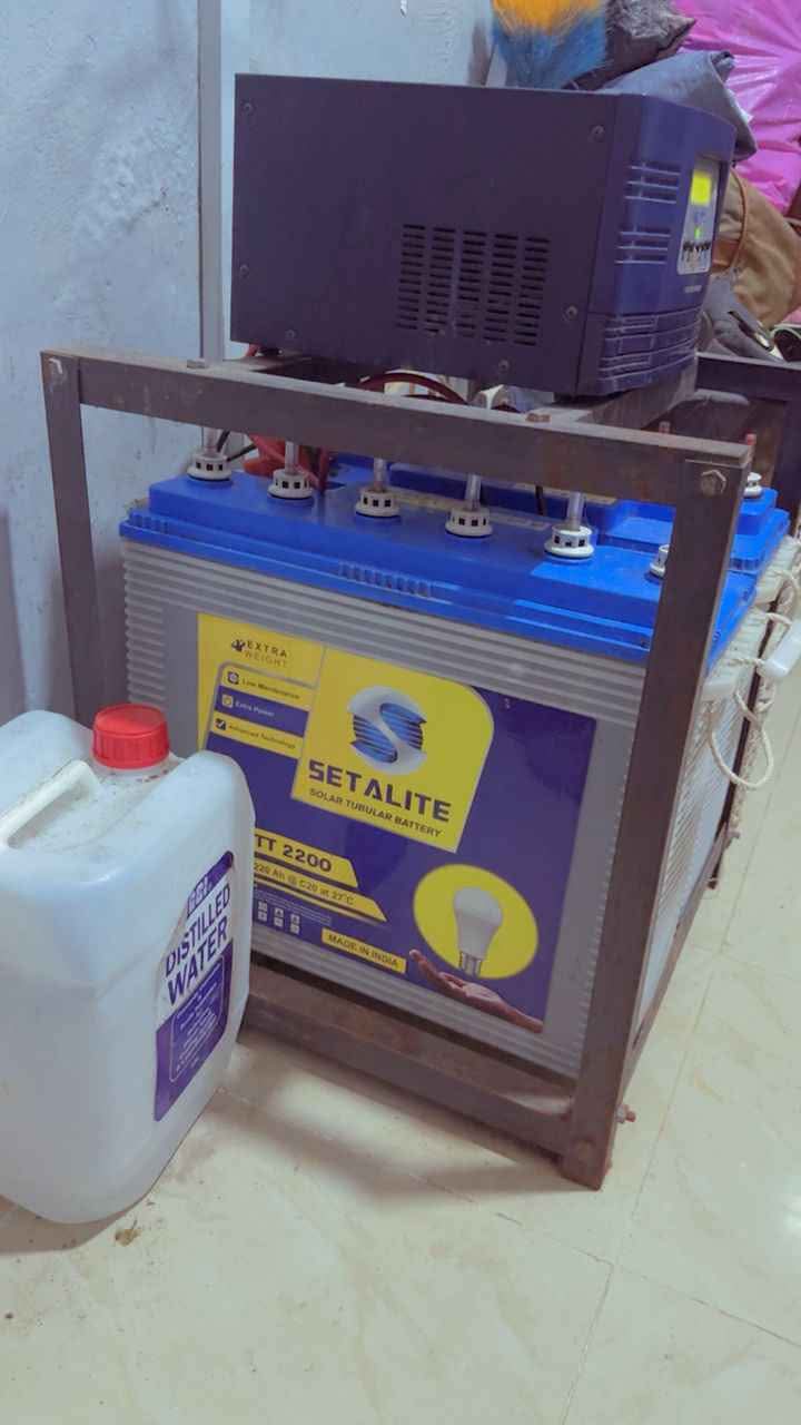 A picture of 2kva inverter 2 units of 220ah battery and rack Please