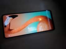 A picture of CAMON 17 pro total of 11grm and 256 gigabit just