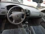 A picture of Mazda 323F first body factory AC papers available no mechanical
