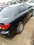 A picture of FIRST BODY NIGERIA USED TOYOTA COROLLA MODEL 2005 FEATURES CE