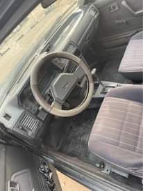 A picture of Mazda 323 available for sale in osogbo complete first body