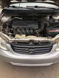 A picture of 2004 Toyota Corolla Engine and gear perfect AC Chilling Catalyst