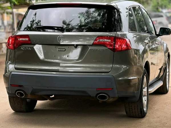 A picture of  NEATLY USED ACURA MDX MODEL 2008 MODEL AWD GREEN