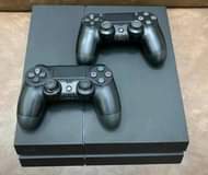 A picture of Ps4 fat 2 controllers version 9 00