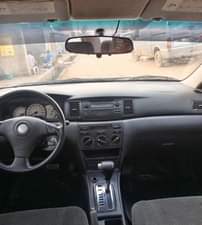 A picture of JUST IN Clean Nigerian Used White Toyota Corolla 2004 Baked