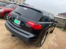A picture of This is super clean Acura MDX 2009 model first body
