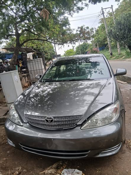 A picture of Distress Toyota Camry Registered Engine and gear Ac chilling