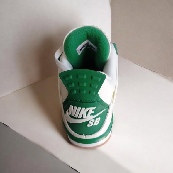 A picture of Nike SB x Air Jordan 4 Retro SP Pine Green