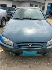 A picture of Seasons greetings from Willy Autos Merry Christmas Over Sharp Toyota