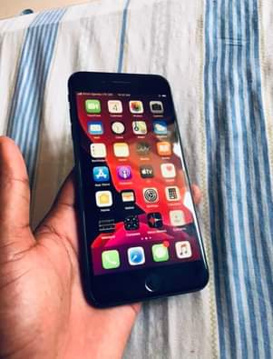 A picture of iPhone 7plus 32gb 100 battery health. Clear cameras at just