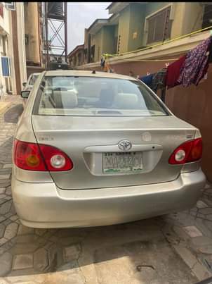 A picture of First Body Toyota corolla 2004 with a sound engine gear