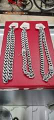 A picture of Iced chains and bracelets