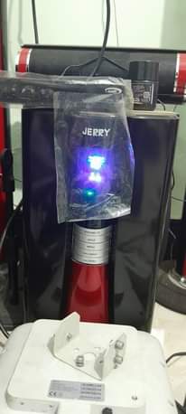 A picture of 43 inc smart plus Tv and Jerry power woofer on