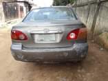A picture of Toyota Corolla 2004 Engine Gear Ac and body needs attention