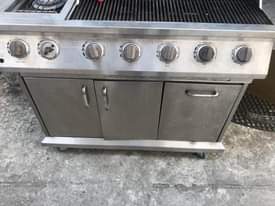 A picture of Foreign Used Ducane stainless steel grill