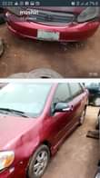 A picture of 2004 model corola painted on first body engine and gear