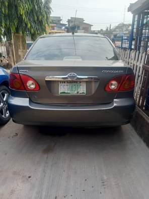 A picture of Toyota Corolla le 2004 Color Gray Properly Used All documents