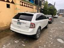 A picture of 010 Ford edge Nigerian used Painted on first body Everything